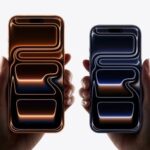 Two models, iPhone 17 Pro Max, iPhone 17 Pro, a hand holds each model, iPhone 17 Pro Max is taller and wider in the hand than iPhone 17 Pro, all screen display, rounded corners